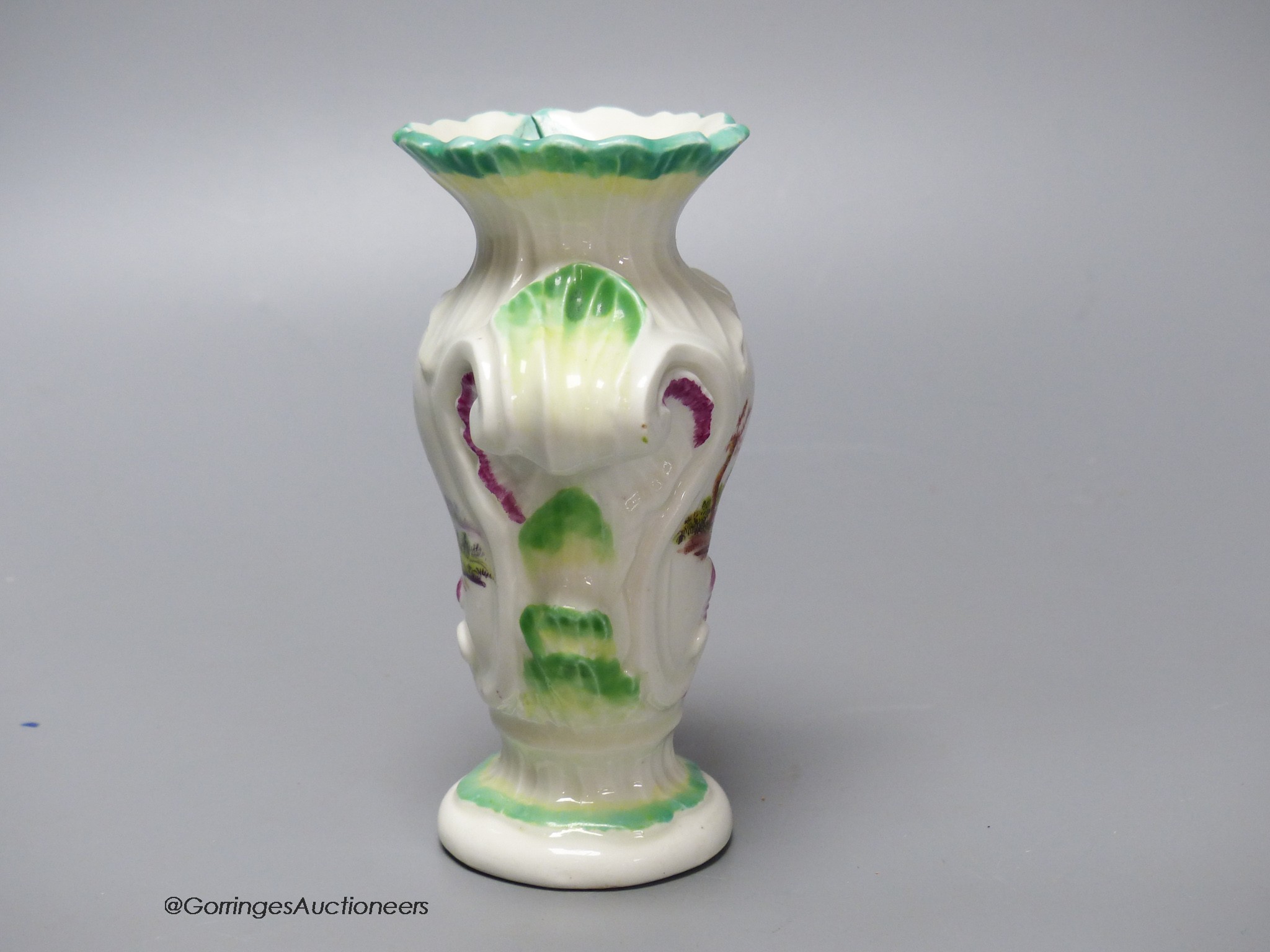 An 18th century Derby asymmetric vase painted with two landscapes, height 12.5cm